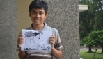 Mahasiswa Kehutanan UGM Menang Kontes Editorial Cartoon FAO. Michael Jose menunjukkan karyanya yang berhasil terpilih sebagai yang terbaik dalam konters tersebut.