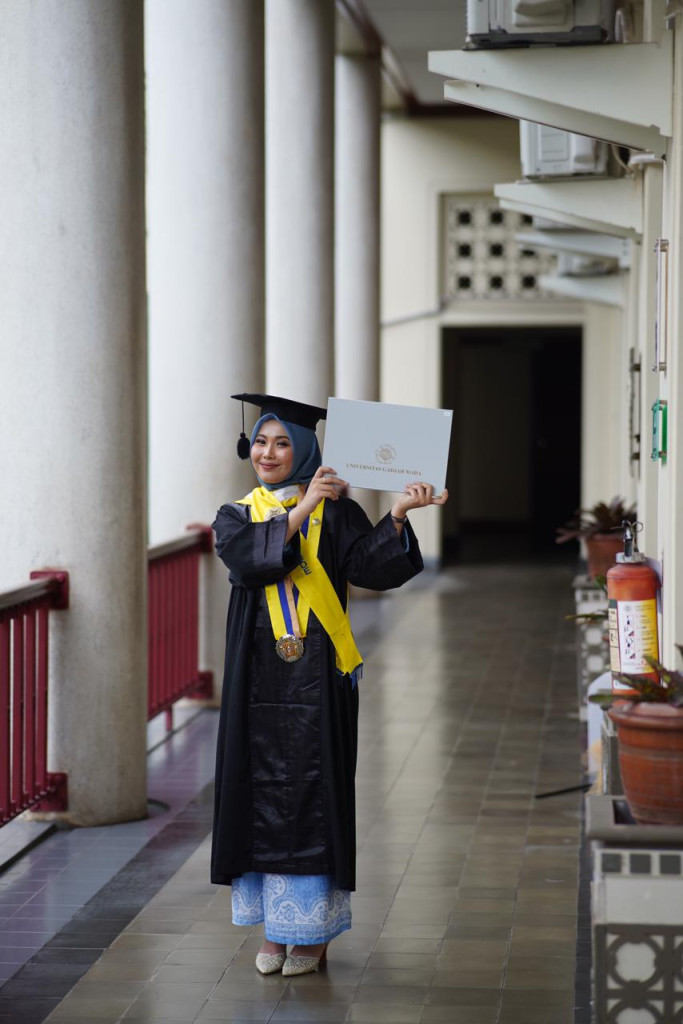 Through UGM’s fast-track program, Tria Sofie completed her master’s degree at 22, becoming the youngest graduate of the Faculty of Geography.