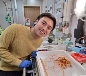 Research vessel navigating icy waters of East Antarctica during scientific expedition