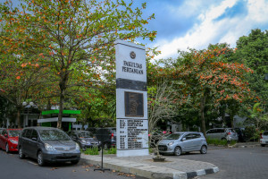 Researchers conducting agricultural studies at UGM