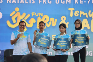 Participants running in Smile to Smile Fun Run at UGM Pancasila Field
