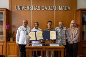 Signing of MoU between UGM and Pegunungan Bintang Regency at Balairung