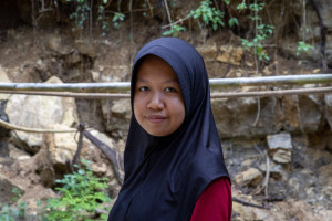 Ristiana Artanti poses at her home after being admitted to UGM with a full scholarship
