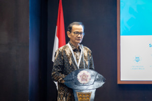 Professor Nizam presents UGM’s KKN program as a model for youth collaboration and community engagement.