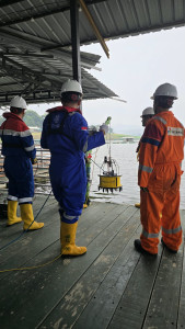 UGM researchers inspect the Prameya underwater seismic sensor during its development and testing.